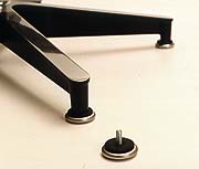 Domes of Silence Charles Eames ES670 lounge chair glides. Genuine original parts for the Herman Miller 670 lounge chair. Photography �2007 Graham Mancha.