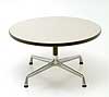 Charles Eames Aluminium Group coffee table. Off-white melamine top supported on a single grey painted pedestal and four-star 'universal' aluminum base. 76cm diameter x 41cm high. Manufactured by Herman Miller. Photography �2007 Graham Mancha