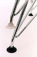 Charles Eames Eiffel Tower wire chair swivel glides. Injection moulded nylon, available in black or white. Herman Miller, Vitra. Photography �2007 Graham Mancha.
